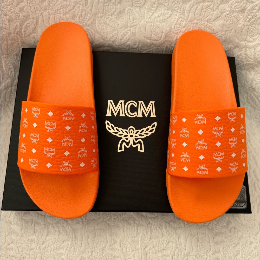 New MCM men’s slides.  Persimmon- orange.   Size 12.   Retail $200.00.   $100